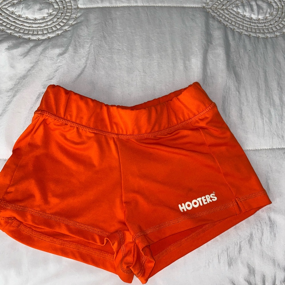 Orange Hooters shorts size XS.